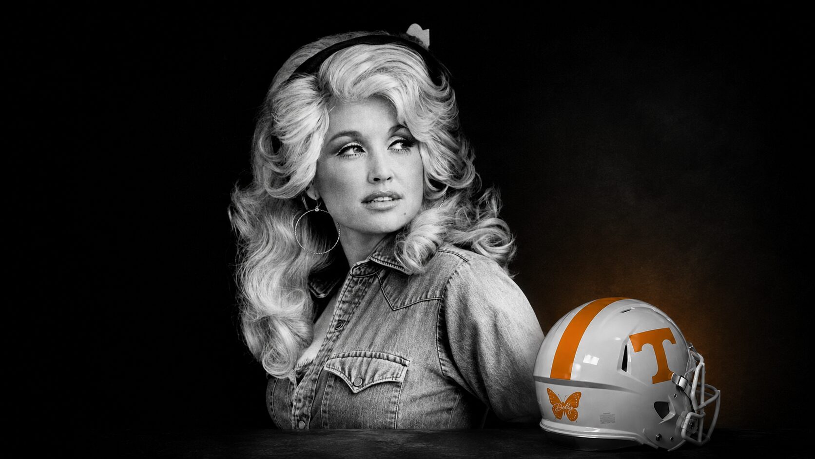 Young Dolly Parton in denim beside a Tennessee football helmet with the Dolly butterfly decal.